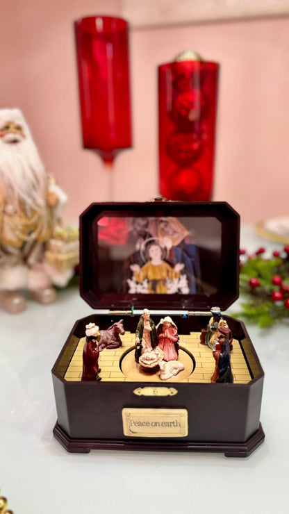 VILA RELIGIOSA COM PRÉSEPIO NATALINO E CAIXA DE MÚSICA 20X14X12CM